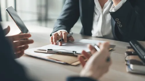 Attorneys reviewing documents in a real estate litigation matter